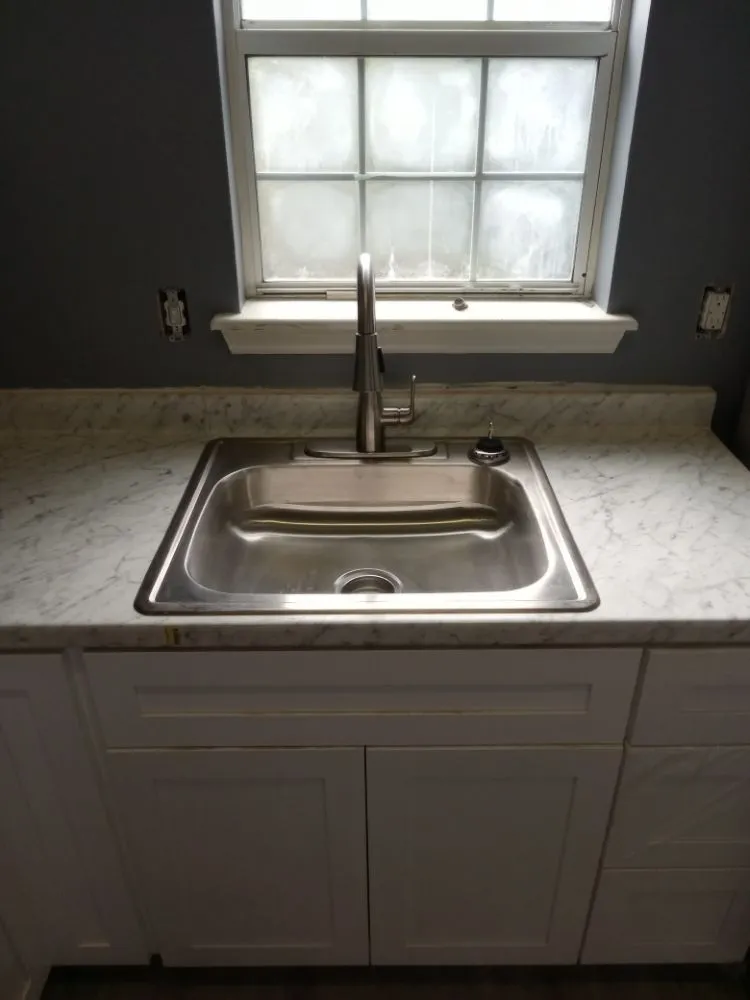 Slide of Great Scott Plumbing