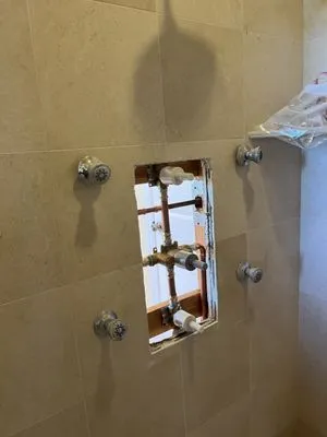 Gus's  Plumbing Logo