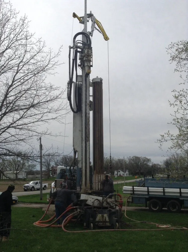 Slide of Hall & Sons Well Drilling