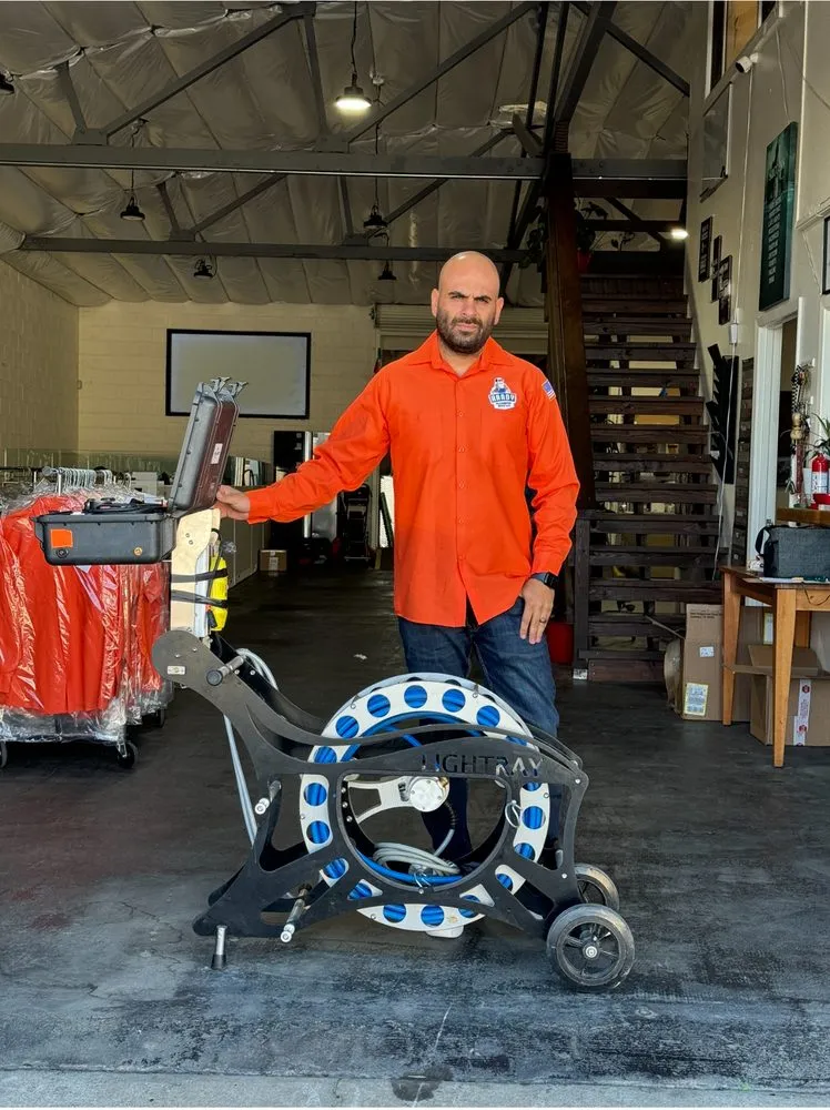 Slide of Handy Plumbing Man