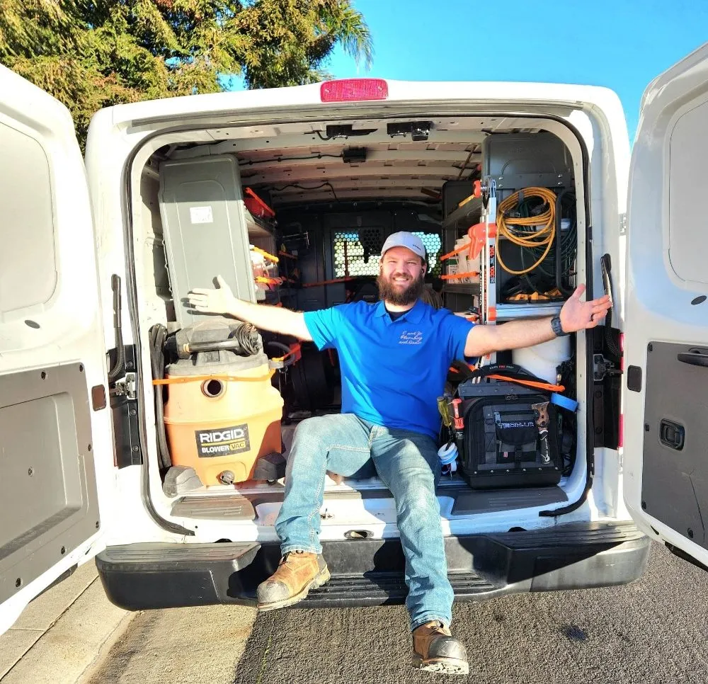 Slide of Happy Dog Plumbers