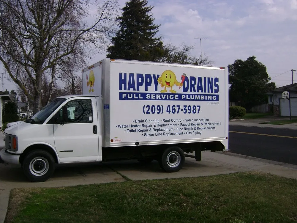 Slide of Happy Drains Plumbing
