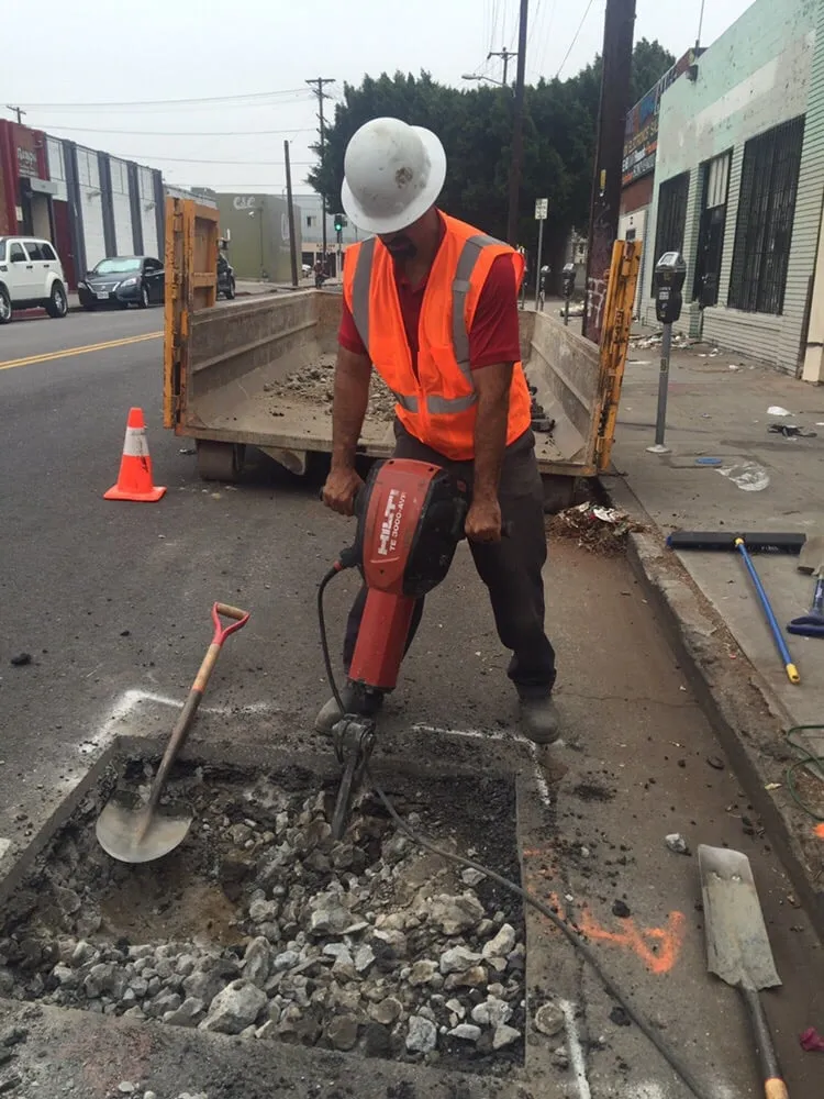 Slide of Hard Hat Rooter and Plumbing