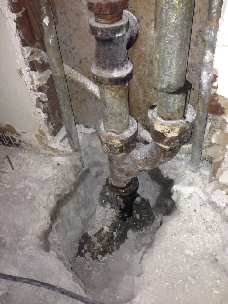 Slide of Hard Hat Rooter and Plumbing