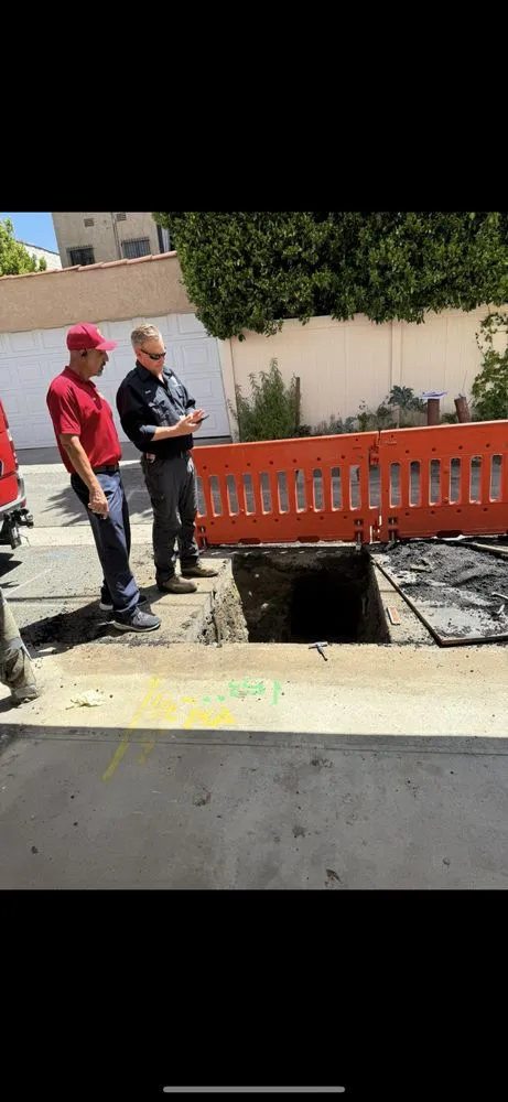 Slide of Hard Hat Rooter and Plumbing