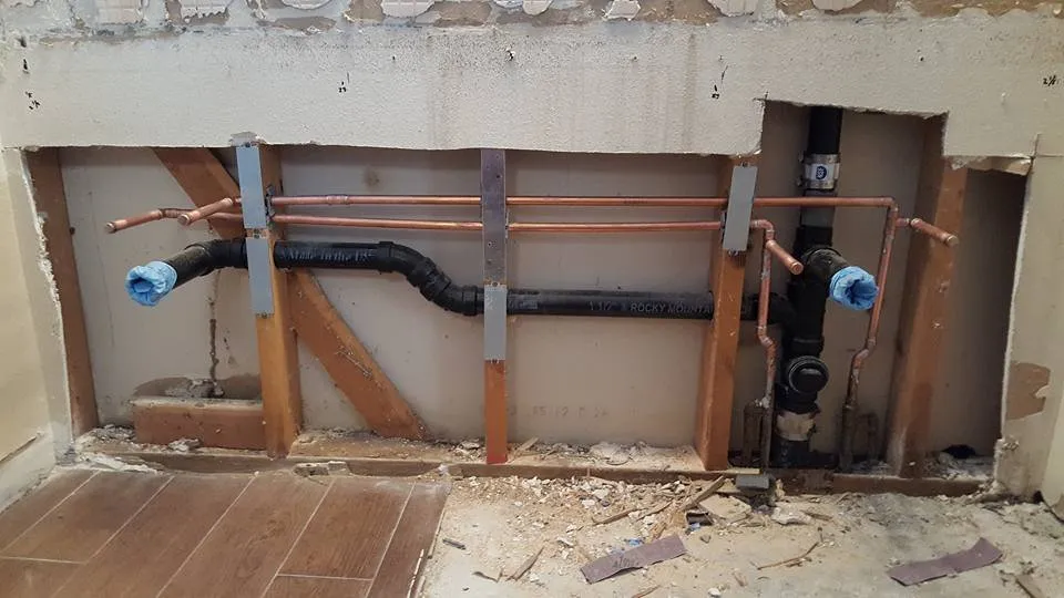 Slide of Helping Hand Plumbing & Drain Services