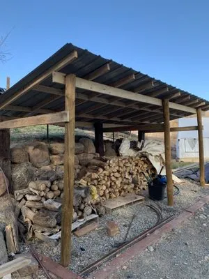 Heman Home Improvement Logo