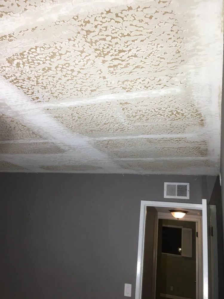 Slide of Henry's Painting And Drywall