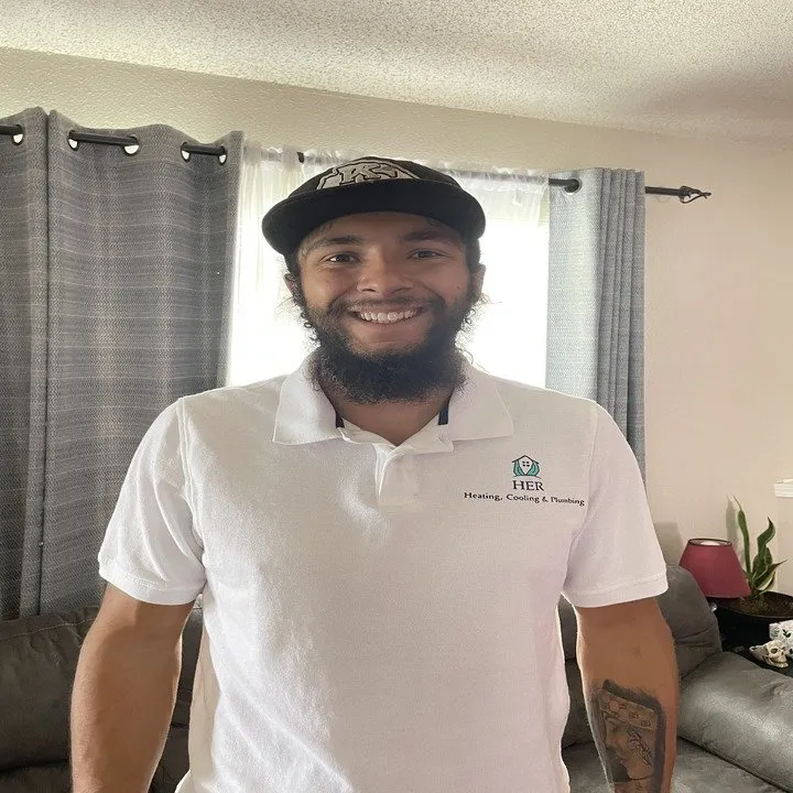 Slide of HER Heating Cooling & Plumbing