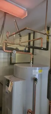 Heuer Plumbing And Heating Logo