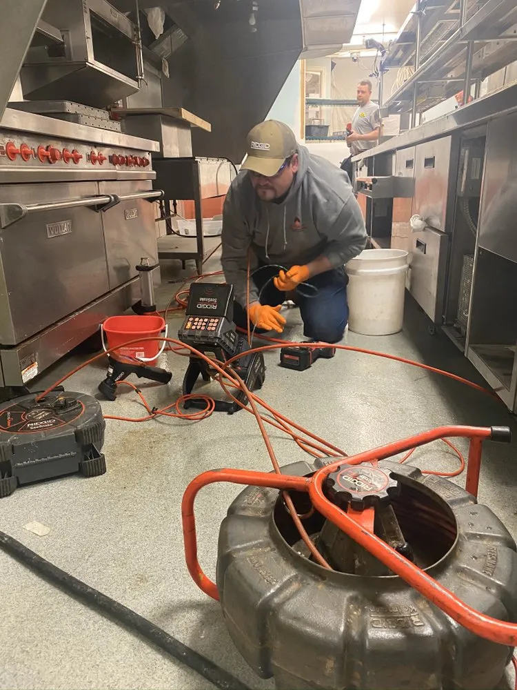 Slide of Hotshots Drain Cleaning