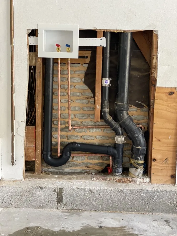 Slide of Hughes Plumbing Services