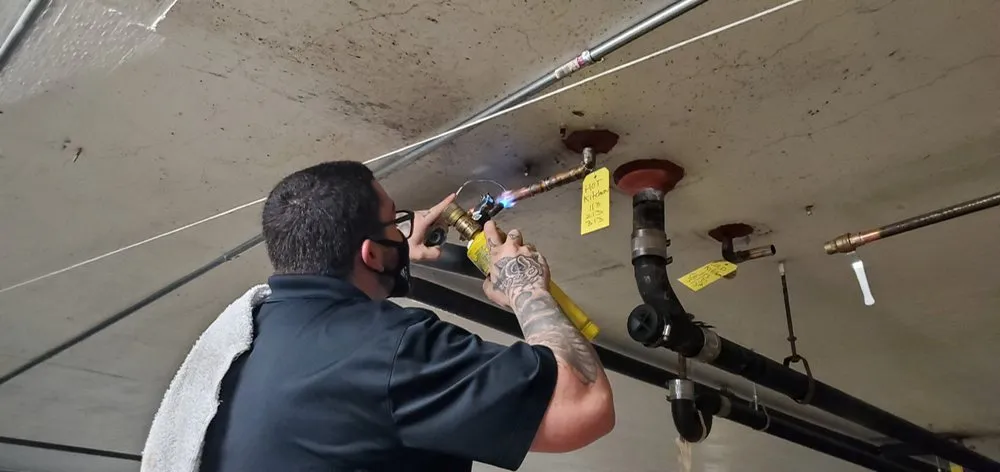 Slide of Hughes Plumbing Services