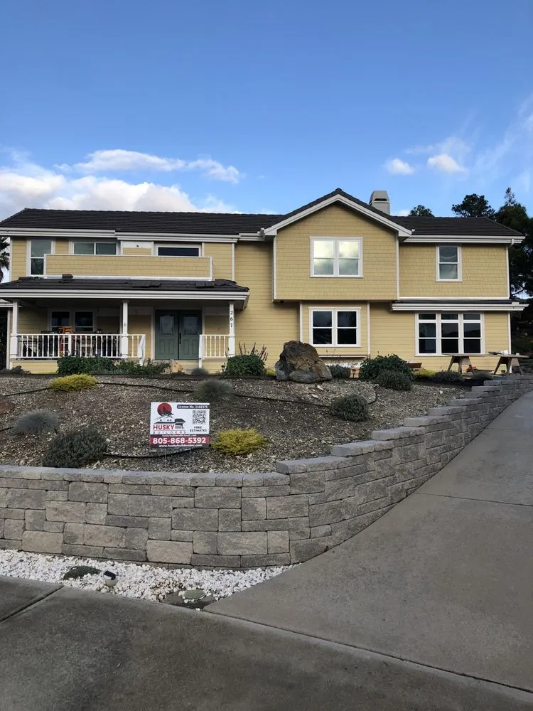 Slide of Husky Builders