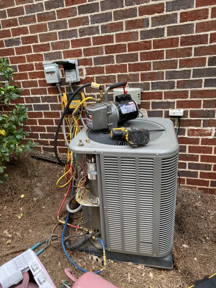 Slide of HVAC Guyz & Plumbing