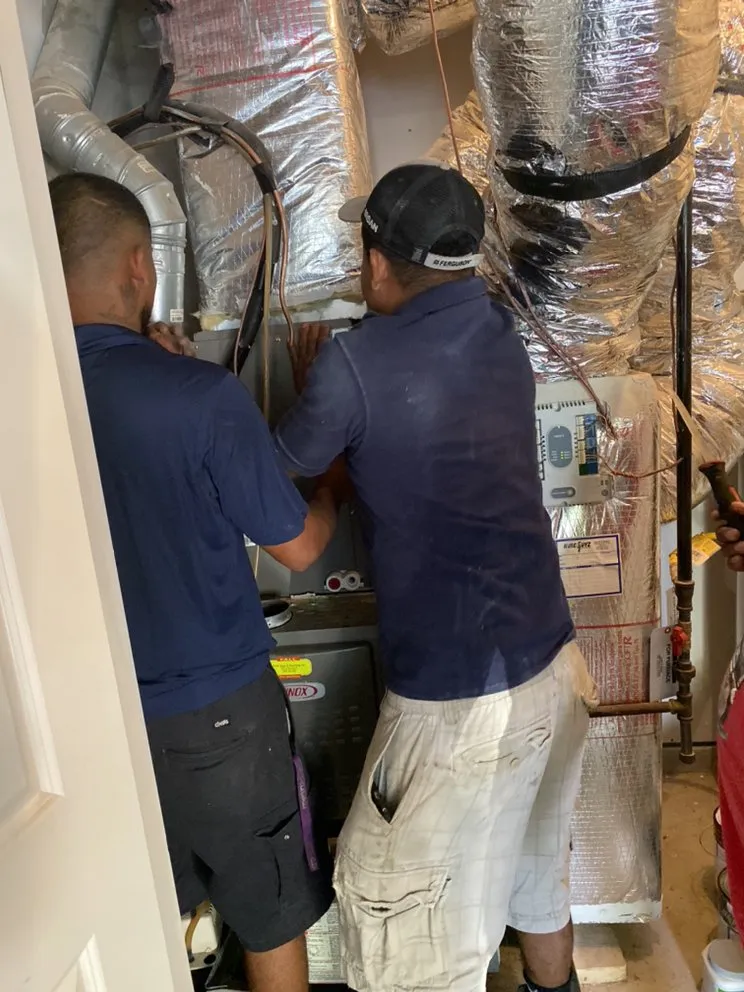 Slide of HVAC Guyz & Plumbing