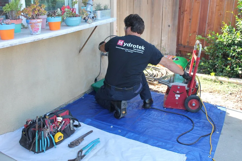 Slide of Hydrotek Pipe Services