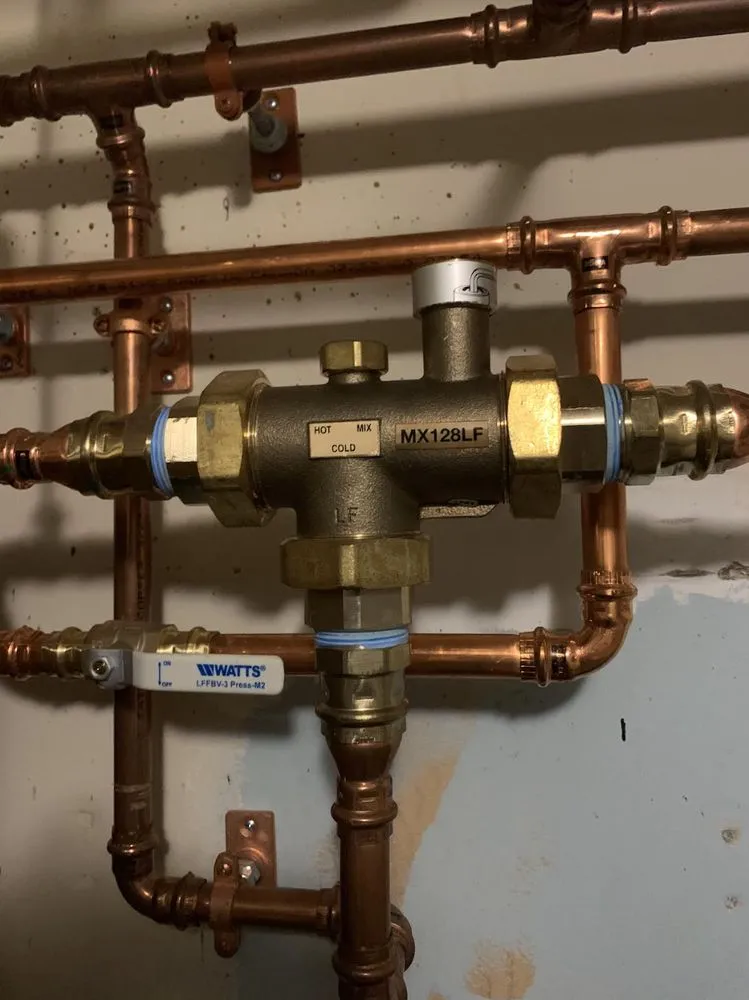 Slide of Imax Plumbing Corporation