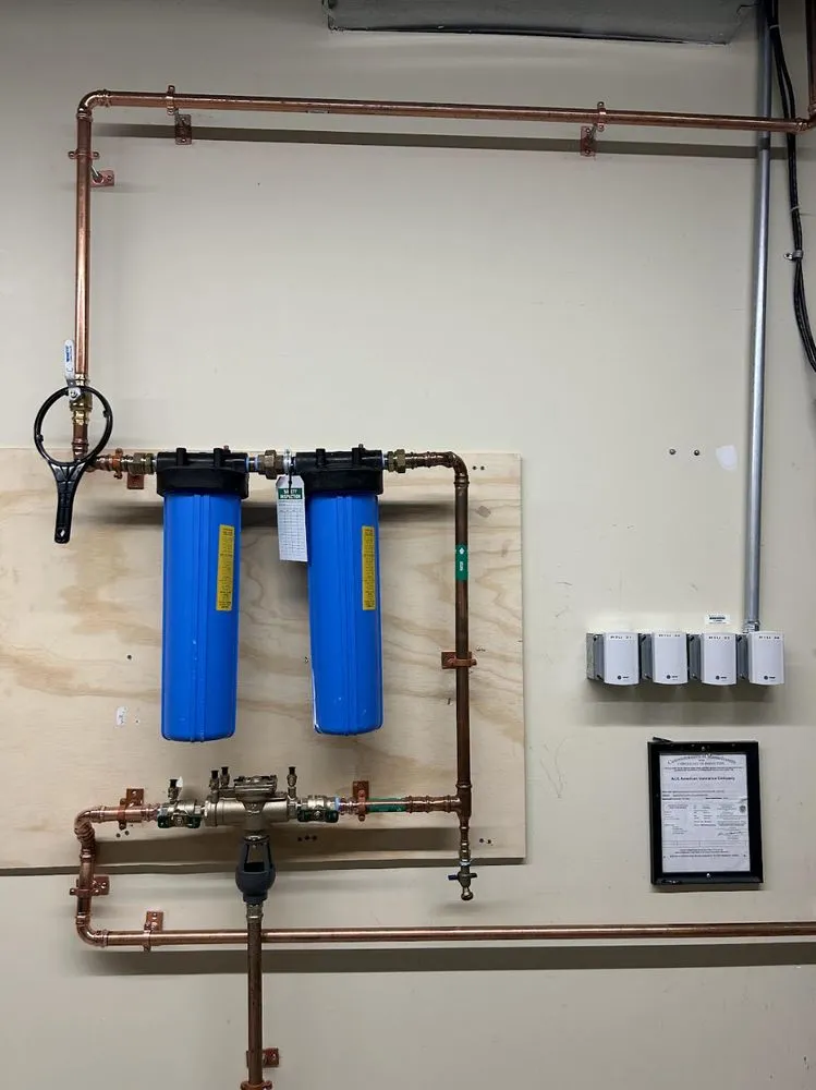 Slide of Imax Plumbing Corporation