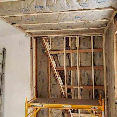 Immaculate Construction & Home Improvement Services Logo