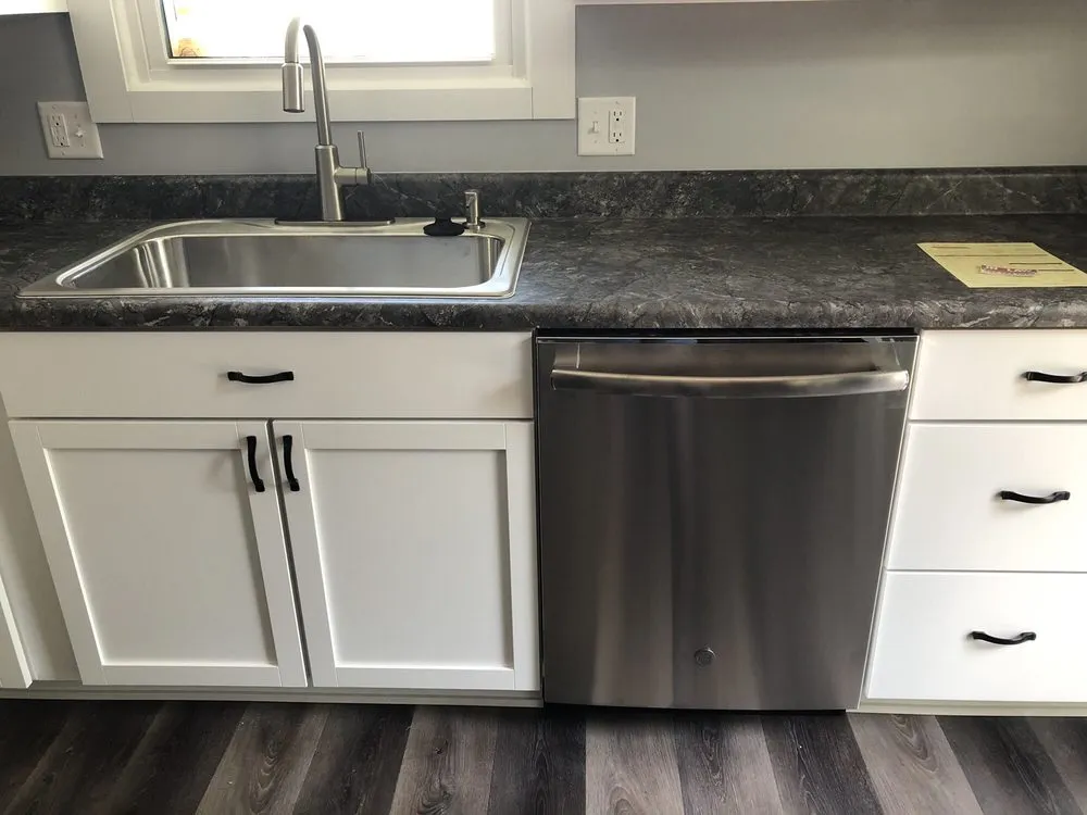 Slide of In-Law Plumbing And Drain Services