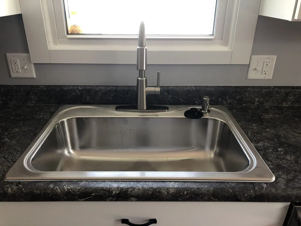 Slide of In-Law Plumbing And Drain Services