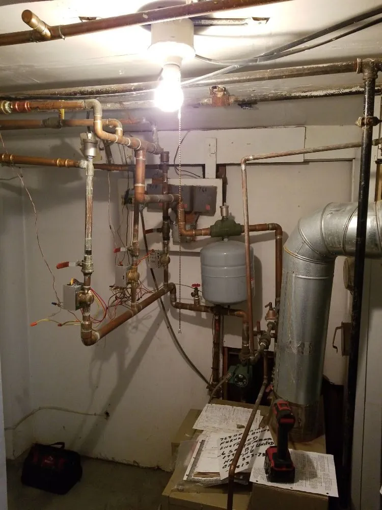 Slide of Iron Plumbing & Construction