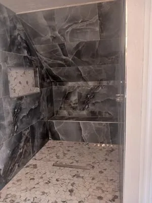 Ismael Ceramics and Porcelain Installations Logo