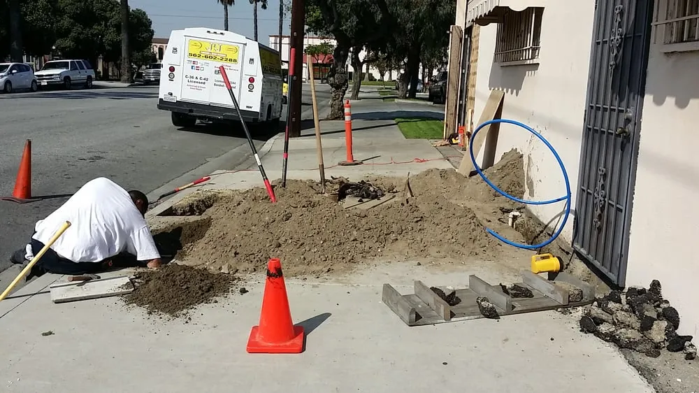 Slide of J & J Plumbing and Drain Cleaning