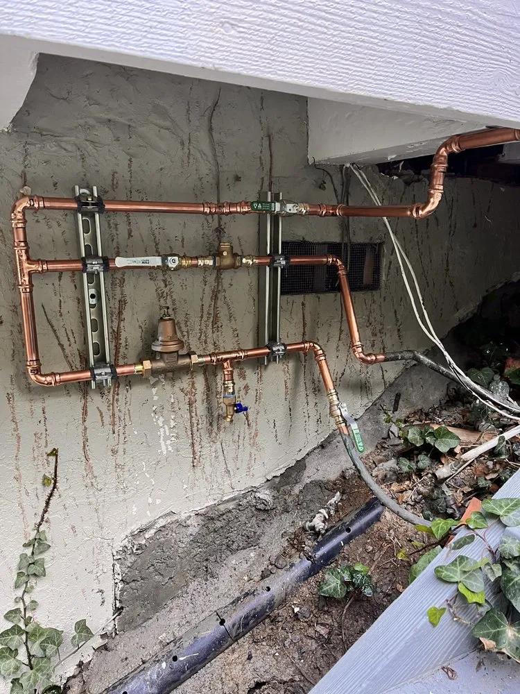 Slide of J Goode Plumbing