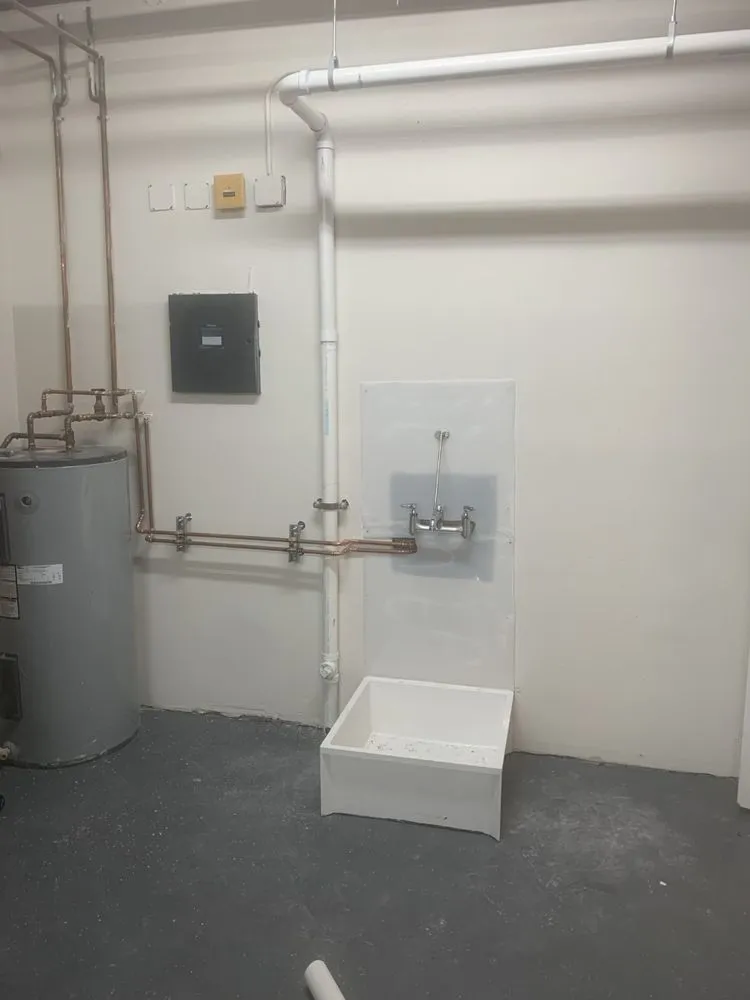 Slide of J Plumbing Services