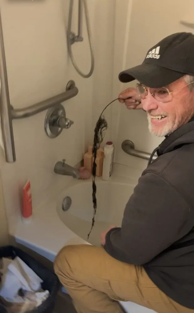 Slide of Jake The Snake Drain Cleaning