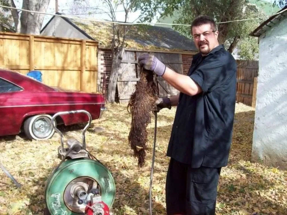 Slide of Jake The Snake Drain Cleaning