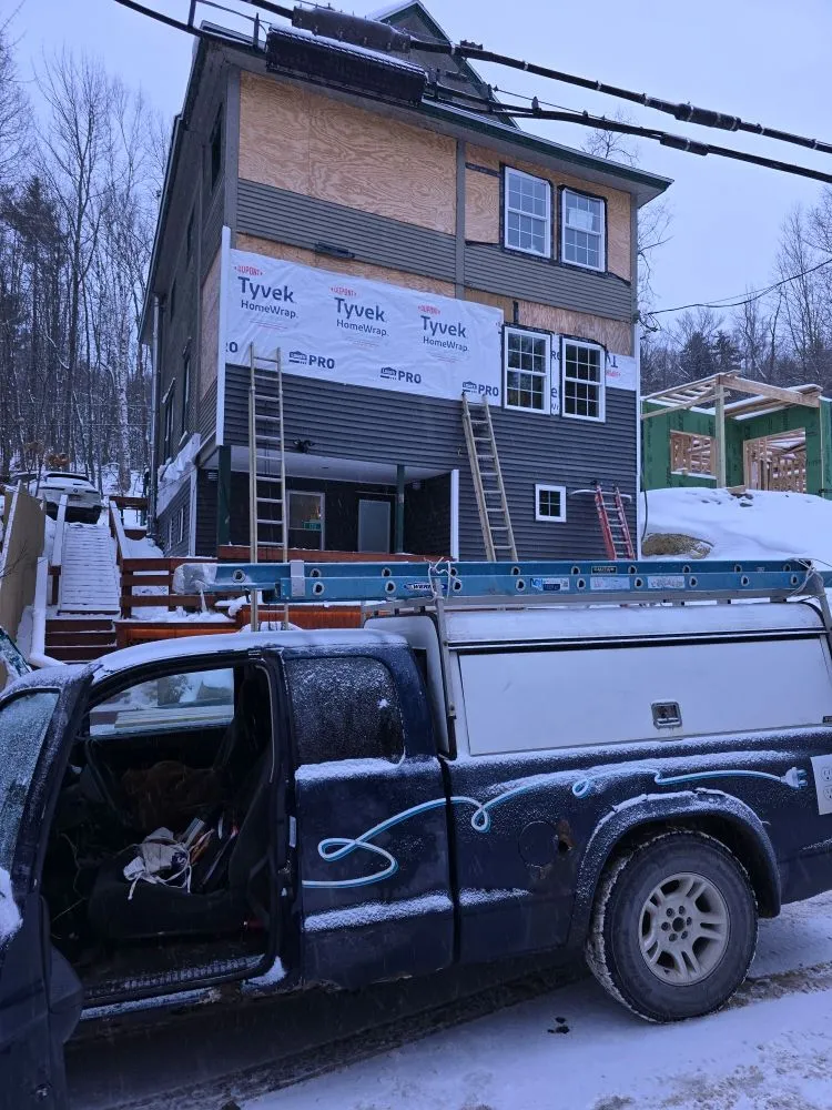 Slide of Jax Snow Electric and Construction