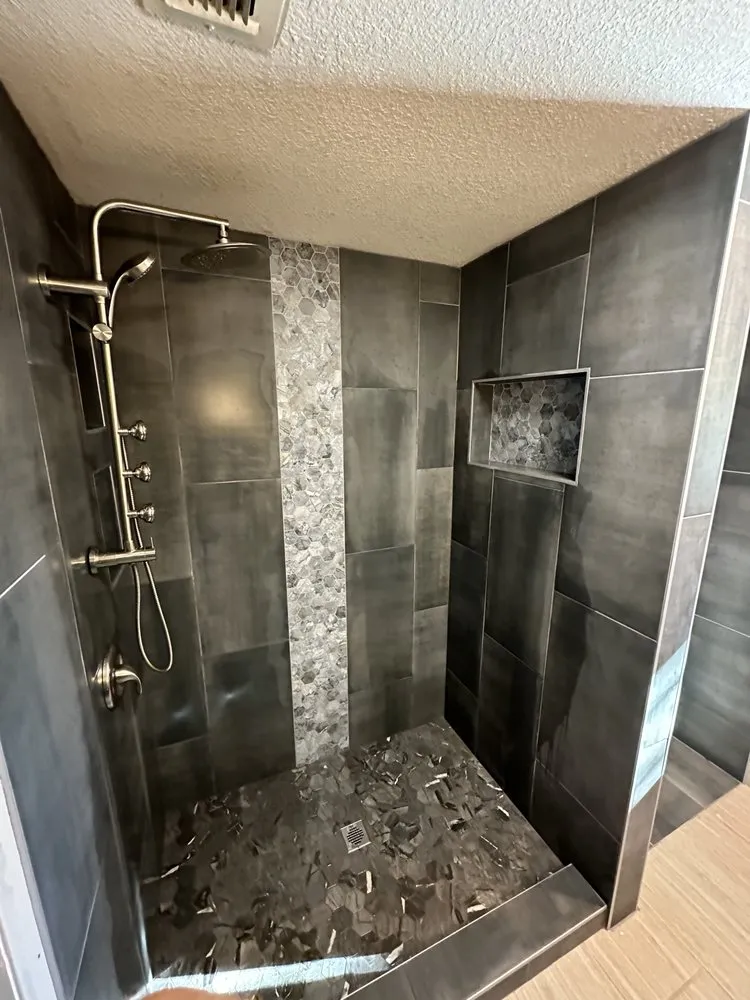 Slide of Jc Enriquez and Son Plumbing