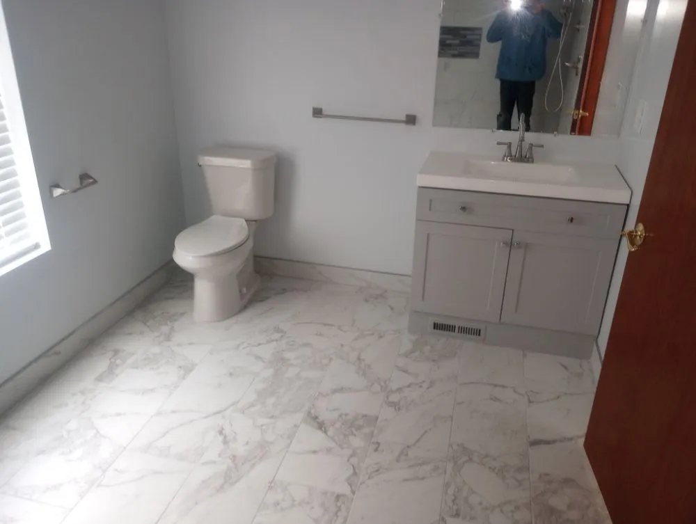 Expert water heater service for homes in New Baltimore, MI by J&D Home Repair Plumbing & Sewer Services