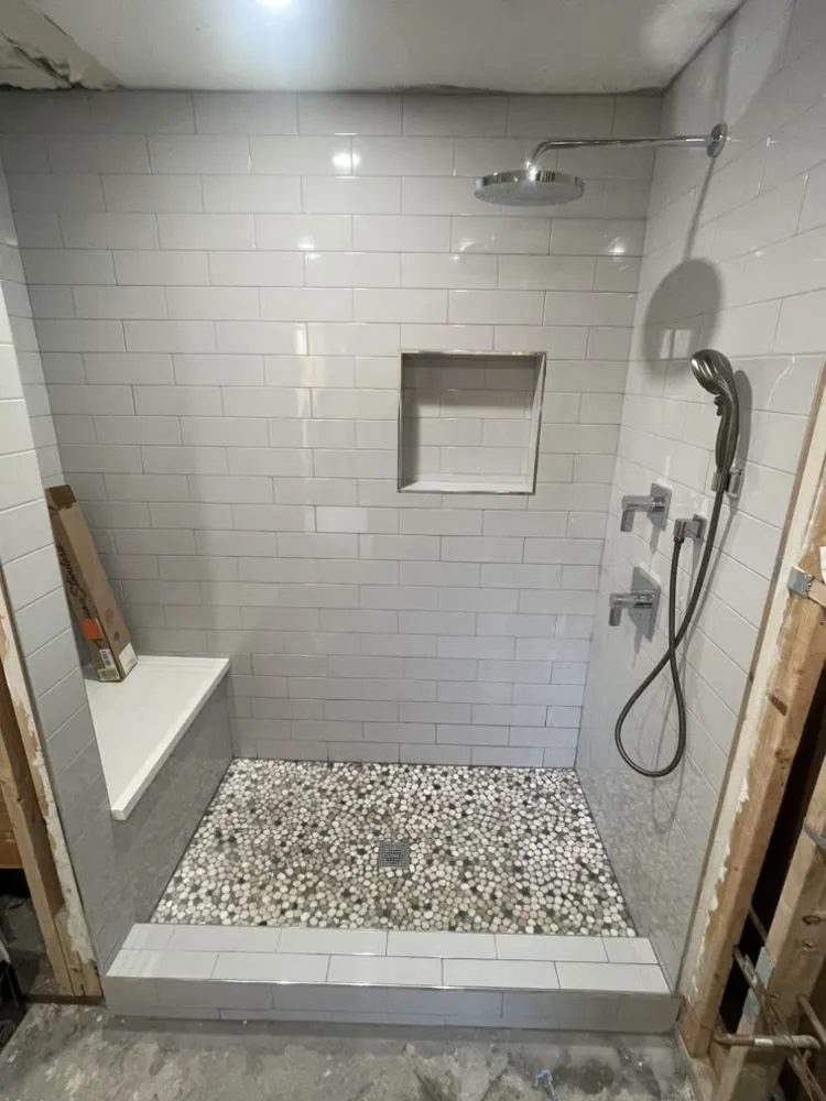 Slide of JDN construction and plumbing