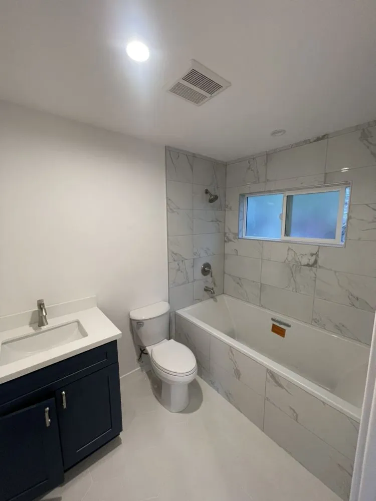 Slide of JDN construction and plumbing