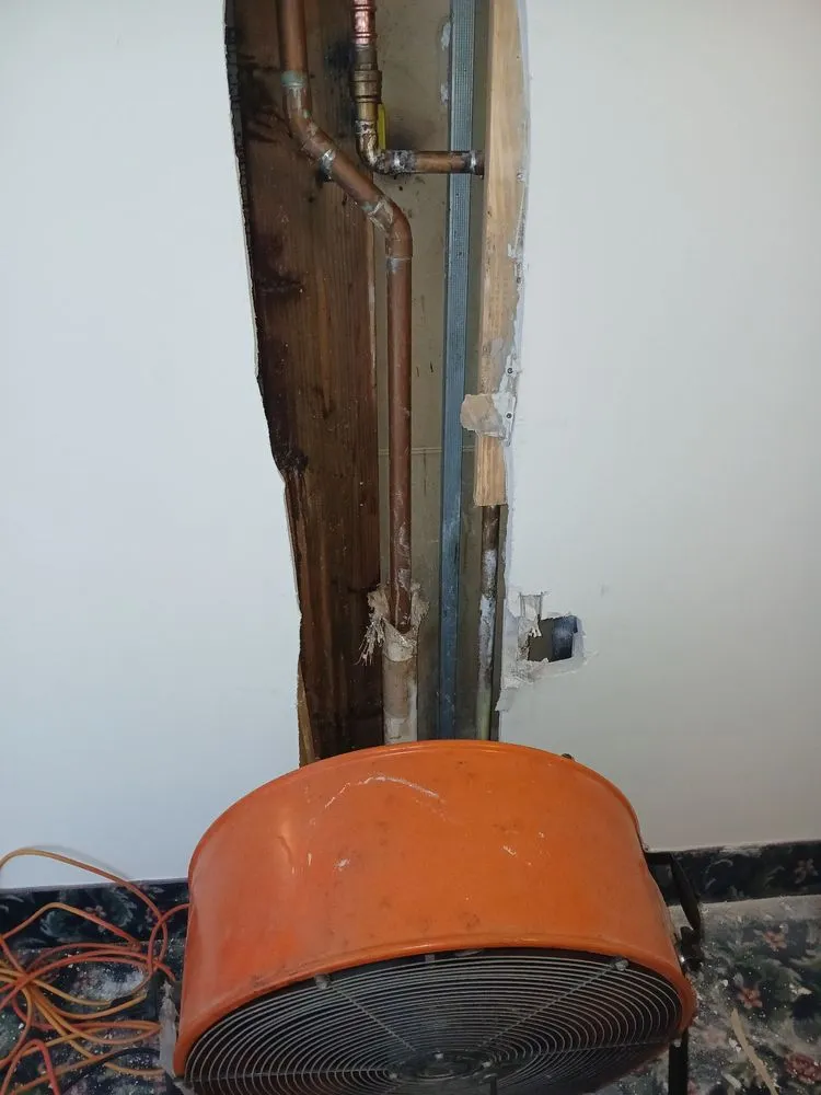 Slide of J&E Johnson Plumbing