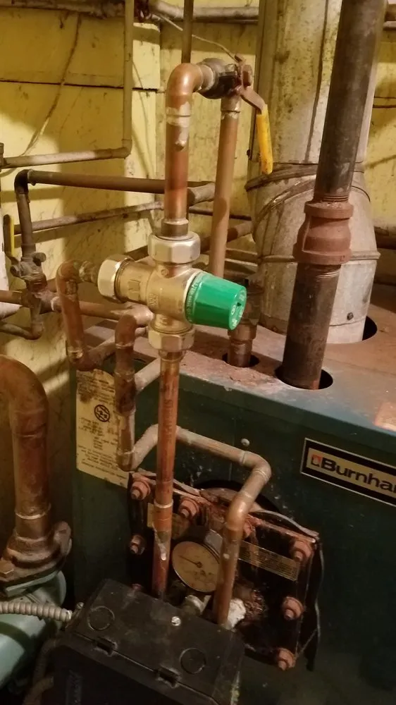 Slide of JFK Plumbing & Heating