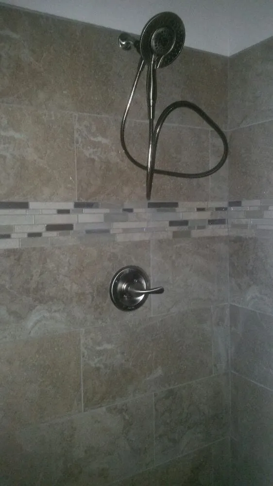 Slide of JL Newman Plumbing Services