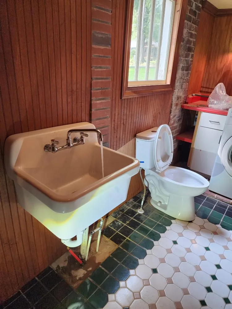 Slide of JL plumbing & service