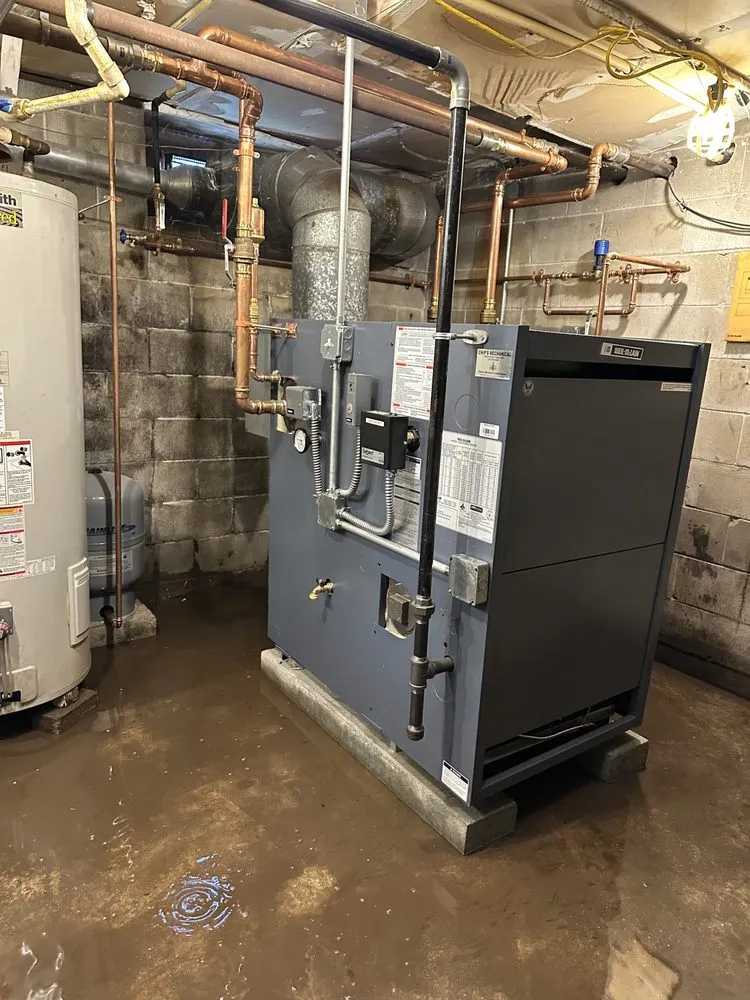 Slide of JL plumbing and heating