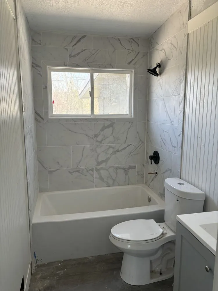 Slide of JM Construction & Plumbing