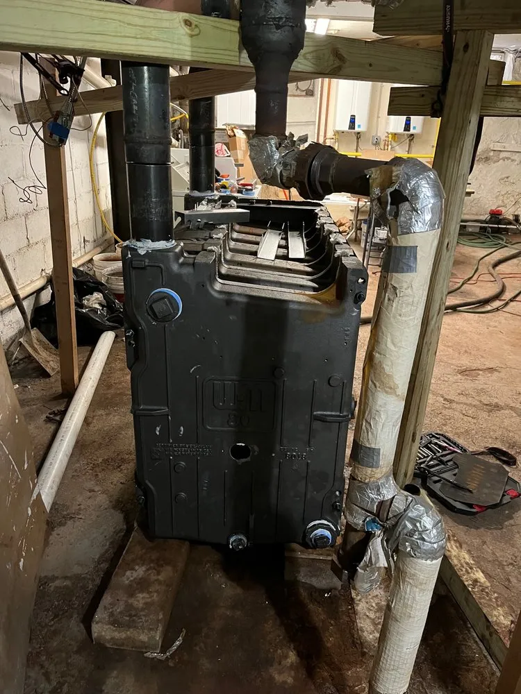 Slide of JMK Plumbing & Heating