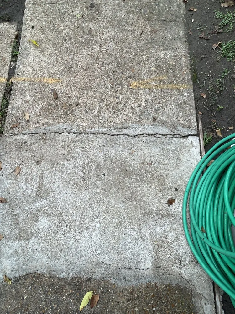 Slide of John Moore Services