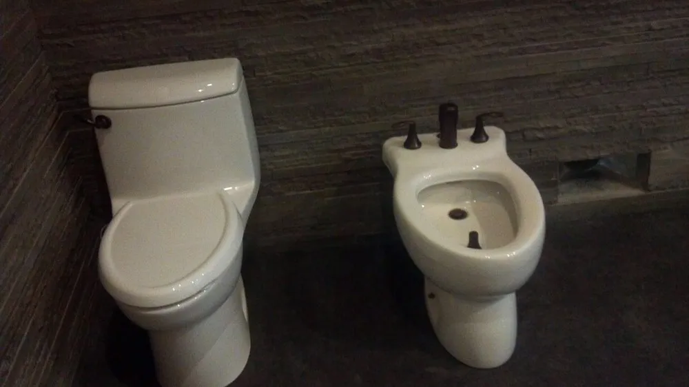 Slide of John the Plumber