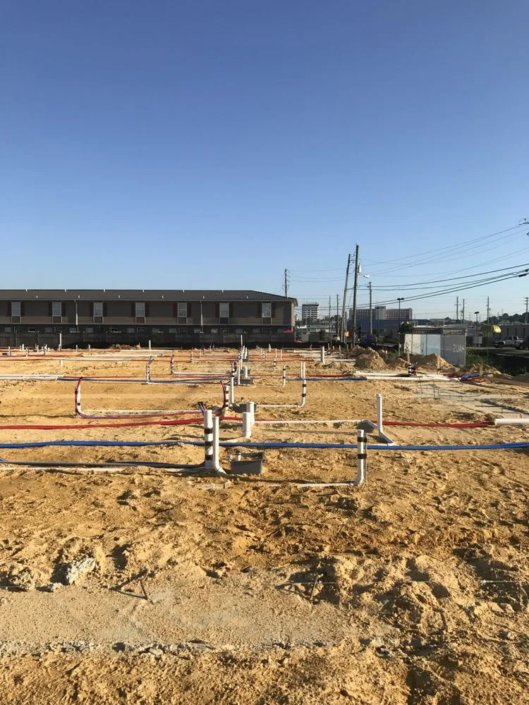 Slide of John Wayne Plumbing