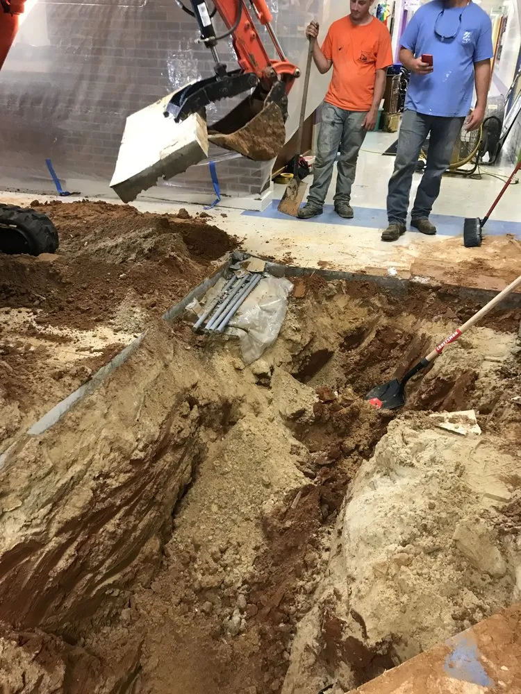 Slide of John Wayne Plumbing