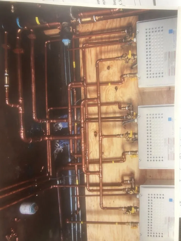 Slide of John Wayne Plumbing